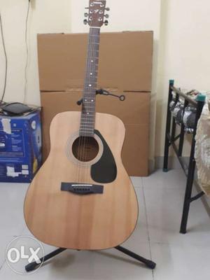 Yamaha f310 acoustic guitar. with stand. 1.5 yrs