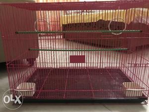 Pink cage for birds, 2 weeks old cage.