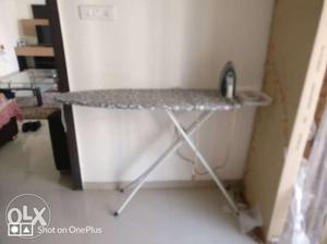 White And Gray Ironing Board And Steam Iron