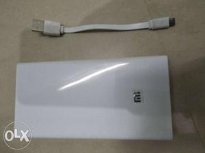 White Xiaomi Power Bank With USB To Micro-USB Cable