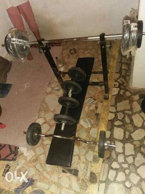12 plates 2 dumble rods 1 bench press rod 1 bench