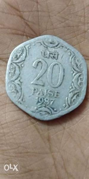 An very old 20 paisa coin