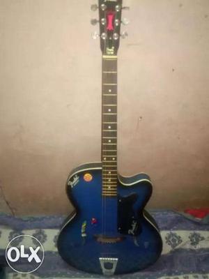 Blue And Black Fender Electric Guitar