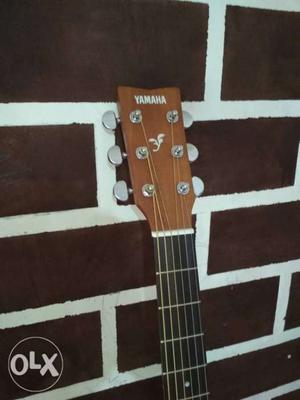 Brown Yamaha Guitar Headstock