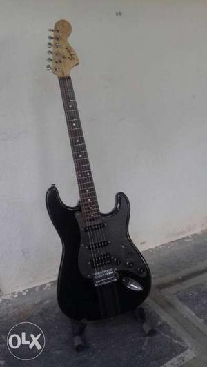 Fender black guitar is in good condition...call