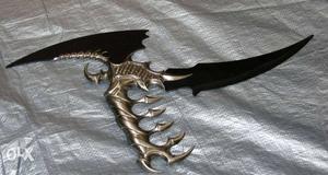 Gray And Black Claw Weapon