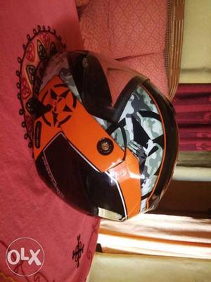 Orange, Black, And White Full-face Helmet