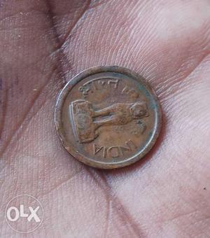 Round Bronze-colored Indian Paise Coin