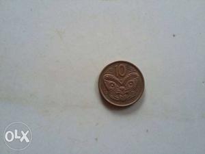 Round Copper-colored 10 Coin