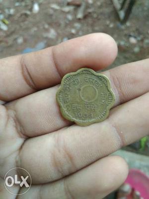 Round Scallop 10 Indian Paise Coin