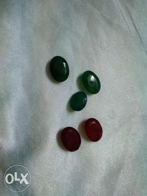 Three Green And Two Red Gemstones