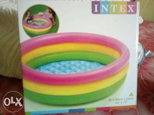 Yellow, Pink, And Green Intex Portable Pool Box