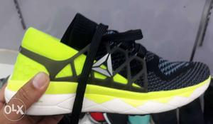 Black And Yellow Running Shoe