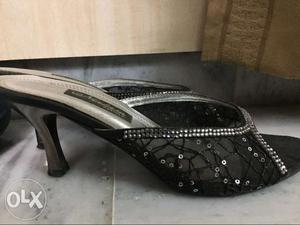 Black net heels. Branded.