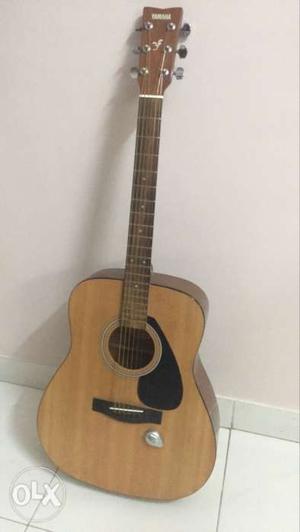 Brown Yamaha F310 Acoustic Guitar with externally attached