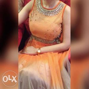 Designer orange gown, one time used,