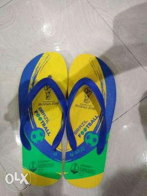 Pair Of Blue-green-and-yellow Rubber Flip-flops