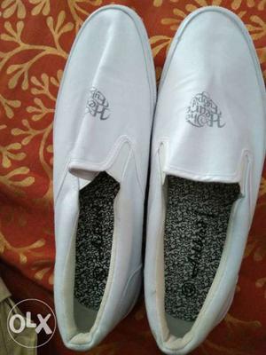 Pair Of White Loafers