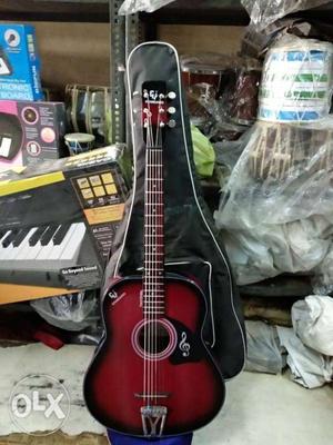 Red And Black Acoustic Guitar With Bag in discount price