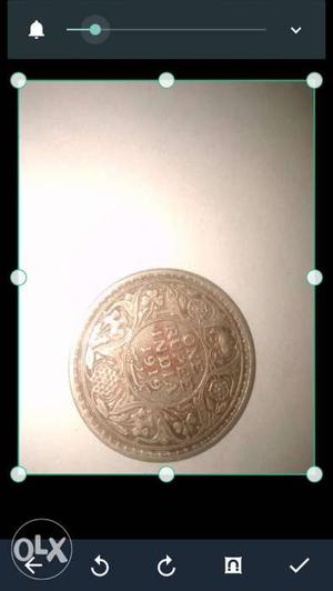 Round Copper-colored 1 India Rupee Coin S
