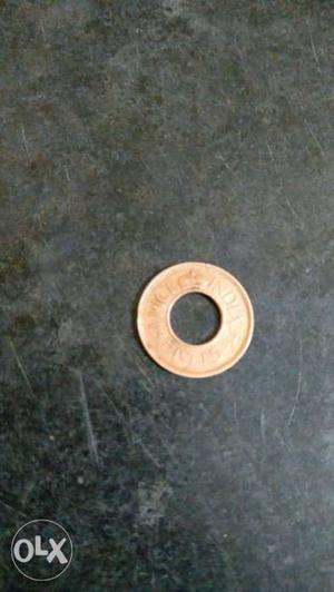 Round Gold-colored Coin