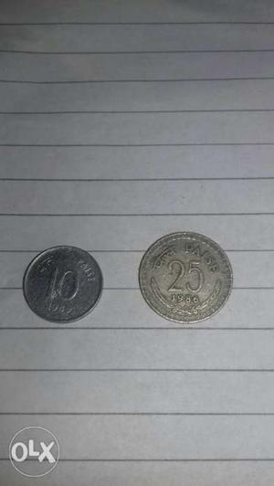 Silver-colored 10 And 25 Indian Paise Coins
