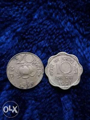 Two Silver-colored 20 And 10 Indian Paise Coins