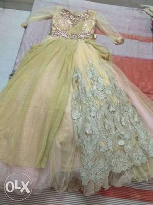 Women's golden and pink floral gown
