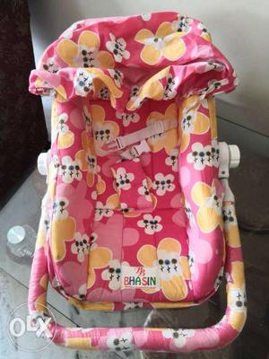 Baby's Pink And White Bouncer