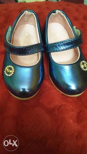 Pair Of Blue Leather Mary Jane Shoes
