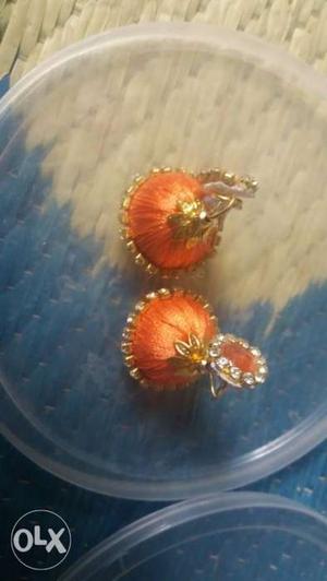 Pair Of Orange Jhumka Earings