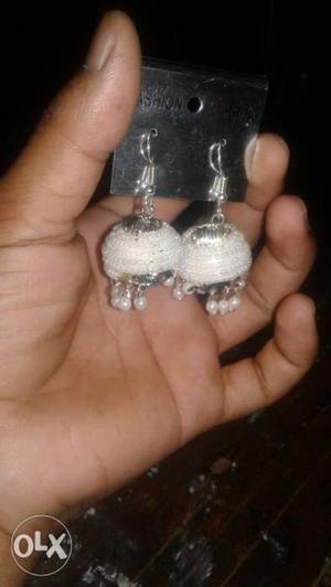 Pair Of Silver-colored And White Hook Earrings