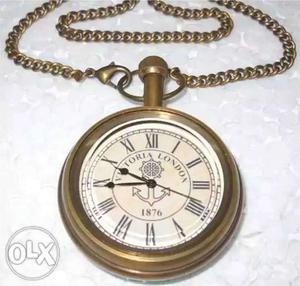 Round Gold And White Pocket Watch