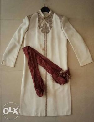 Sherwani hardly used 2 times. In good condition.
