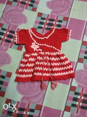 This is a baby frock of woolen.My mother made it