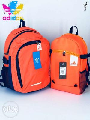 Two Orange Adidas Backpakcs