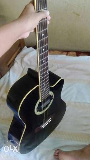 Acoustic Guitar With bag. ROCKS brand.
