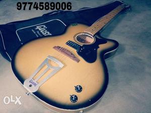 Beige Gibson Acoustic Guitar