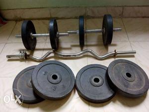Black Weight Plates And Dumbbells