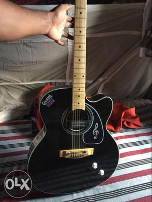 Givson Black And Brown Cutaway Acoustic Guitar