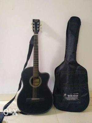 J&D Acoustic Guitar. Good for learning