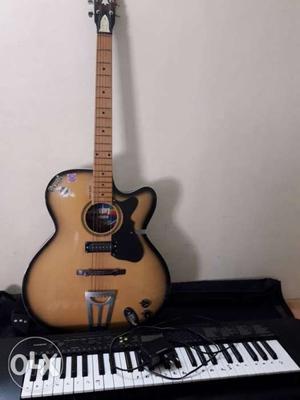 New givson guitar with tuner, guitar cover, picks