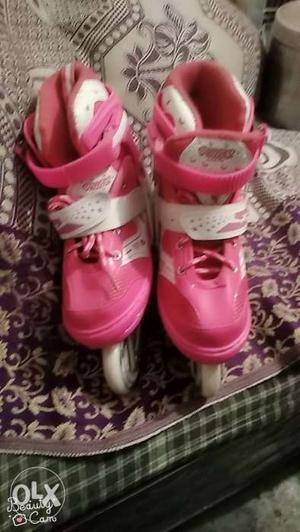 Pair Of Pink Nike Basketball Shoes
