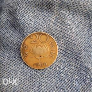 Round  Copper-colored 20 Indian Paise Coin