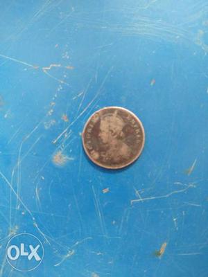Silver-colored Male Profile Coin