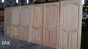 Six Brown Wooden 3-panel Door Frames