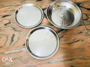 Three Round White-and-brown Ceramic Plates