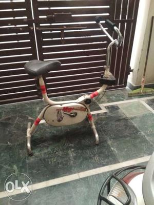 White And Red Stationary Bicycle for exercise