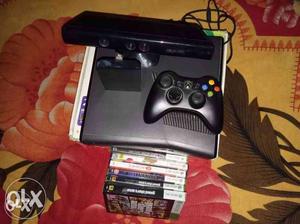 Black Xbox 360 Console With Controller And Game Cases with