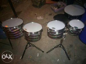 Four Gray Drums